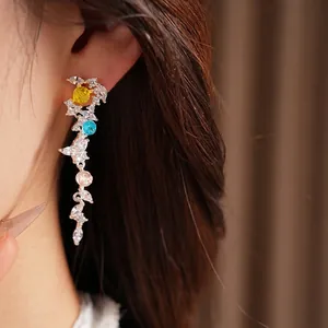 Elegant silver leaf tassel earrings featuring sparkling zircon and vibrant colorful stone accents