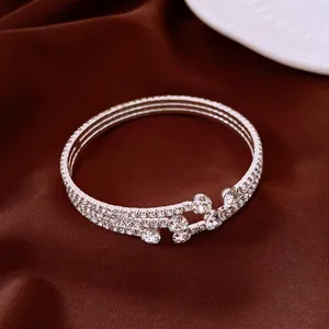 Detailed view of a vintage silver stretch open bracelet with shimmering rhinestone layers