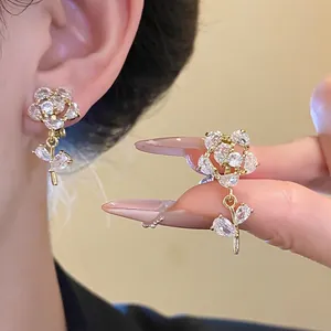 Elegant 14k gold plated zircon flower ear clips with delicate sparkling petals