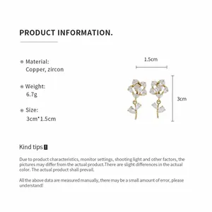Detail view of 14k gold plated zircon flower ear clips with size and weight info