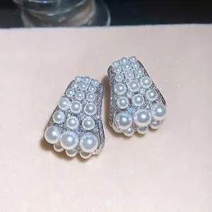 French vintage zircon pearl stud earrings with elegant silver finish and tapered design