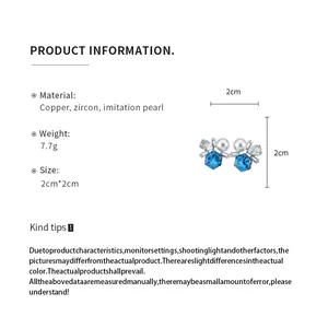 Detailed technical specification of blue crystal and pearl earrings with dimensions