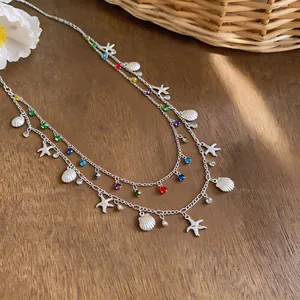 Collana a doppio strato in stile resort con ciondoli a conchiglia e stella marina