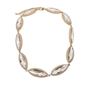 Vintage gold-toned choker necklace featuring clear marquise-shaped crystal accents