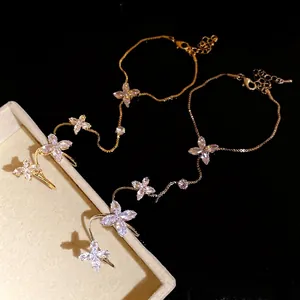 Elegant zircon flower slave bracelet with marquise-cut stones on black background
