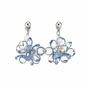 Elegant silver stud earrings with blue translucent flower petals and pearls.