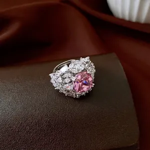 Luxury silver ring with cushion-cut pink gemstone and marquise white zircon