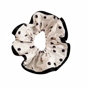 Elegant French style polka dot scrunchie for vintage hairstyles in black and white