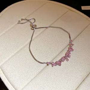 Elegant pink zircon heart and bowknot bracelet with adjustable silver chain for women