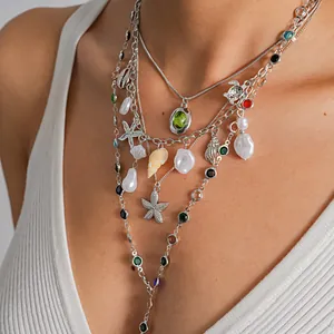 Bohemian layered necklace with pearls sea star and shells charms for summer vacation