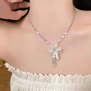 Elegant French style pearl flower necklace with heart chain and waterdrop pendant for women