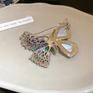 Luxury asymmetric butterfly brooch with zircon and shell inlay for elegant suits