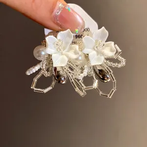 Handmade white gardenia beaded flower earrings with elegant pearl and glass accents
