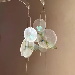 Forest style drop earrings with chiffon butterfly wings and shell flower tassels