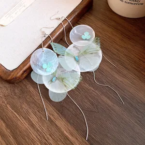 Detail shot of forest style chiffon butterfly shell flower tassel dangle earrings