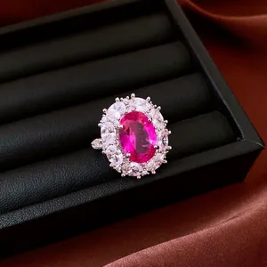 Luxury vintage oval pink zircon flower ring with sparkling halo stones in a display box