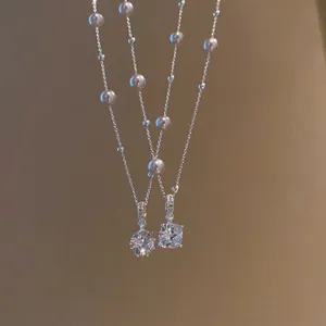 Elegante Perlenkette im koreanischen Stil mit runden und eckigen Zirkonia-Anhängern