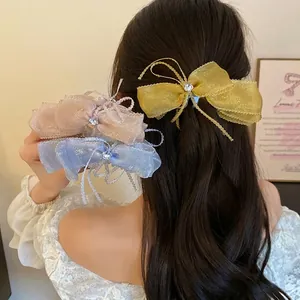Romantic organza bow banana hair clip for elegant ponytail hairstyles in sweet vacation style
