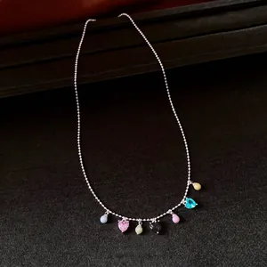 Vintage silver bead chain necklace featuring colorful heart and round crystal charms