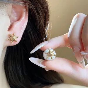 Elegant 18k gold plated snowflake and pearl stud earrings with french vintage style for women