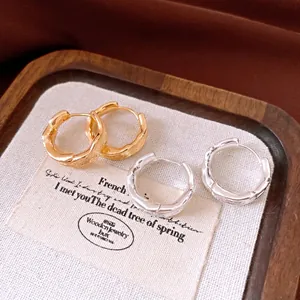 18k gold plated and silver textured hoop earrings for women in a vintage fashion style
