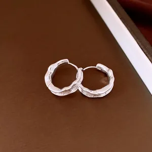 Elegant 18k gold plated silver-toned pleated hoop earrings with a vintage texture.