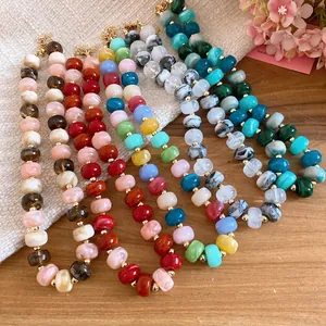 Handmade colorful beaded necklace with geometric acrylic stones and gold spacers