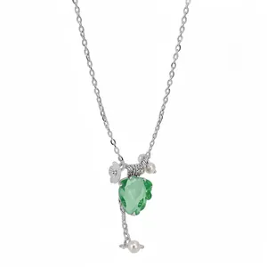 Silver necklace featuring a green resin grape pendant with flower and pearl details