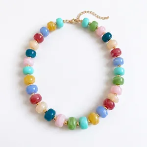 Vibrant handmade colorful beaded geometric necklace featuring elegant gold-tone accents.