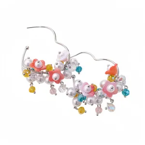 Sweet silver needle hoop earrings with colorful flower charms and elegant white pearls