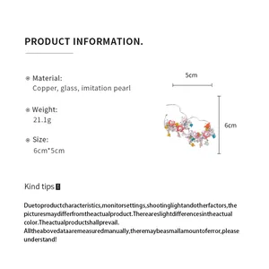 Detailed product specifications for floral drop earrings showing size and copper material