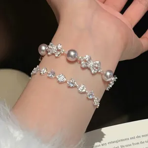 Bracelet Coulissant Élégant Nœud Perles Artificielles pour Femmes Cuivre Incrusté de Zirconia Bijoux de Main Réglables Luxe