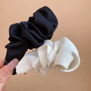 Elegant black and white satin scrunchie banana clips for high ponytail styling