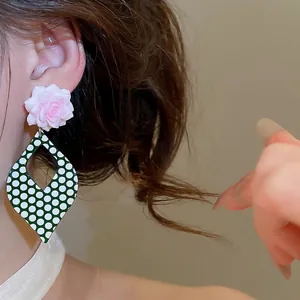 Retro green and white polka dot flower earrings with pink rose detail for women