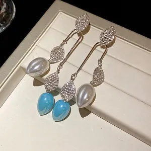Elegant vintage leaf drop earrings with sparkling rhinestones and drop pearls 925