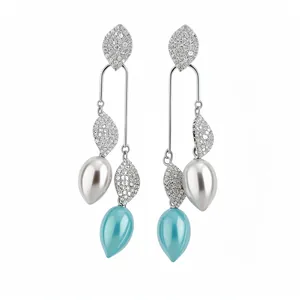 Elegant vintage style leaf drop earrings with sparkling rhinestones and faux pearls