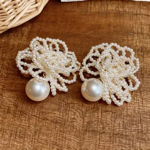 Elegant French style beaded flower pearl stud earrings with silver needles for women