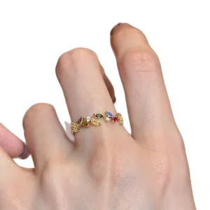 Elegant vintage style open ring featuring colorful dopamine zirconia stones in a gold finish