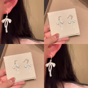 Elegant Bowknot Tassel Copper Zirconia Drop Earrings For Women Silver Color Ear Hook Fashion Niche Design Jewelry Accessories