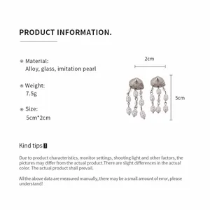 Product specification detail showing shell pearl tassel earrings with dimensions
