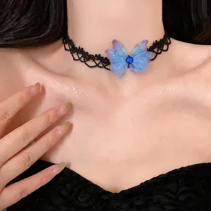 Close-up detail of a lace choker with a vibrant blue chiffon butterfly and gem