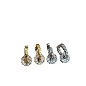 Elegant zircon circular pendant hoop earrings available in gold and silver finishes