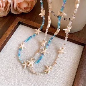 Elegant Bohemian crystal beaded necklace with white starfish charms for resort style outfits