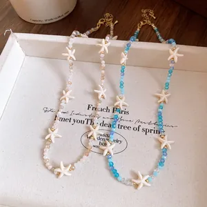 Detailed view of Bohemian style crystal beaded necklaces featuring white starfish charms