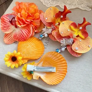 Bohemian style artificial flower and seashell hair clips with faux pearls and rhinestones