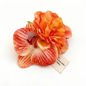 Elegant orange fabric flower hair clip with orchid and peony design for resort style