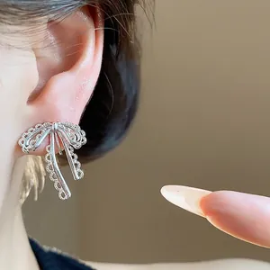 Elegant silver lace bow clip-on earrings for women, stylish and sweet design
