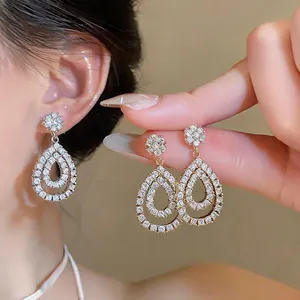 Elegant cubic zirconia teardrop hollow earrings with sparkling stud design for women