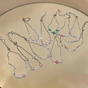 Detailed view of colorful zircon flower bracelets with adjustable chains in luxury style