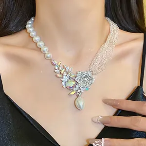 Elegant rhinestone pearl pendant necklace with floral design and iridescent stones